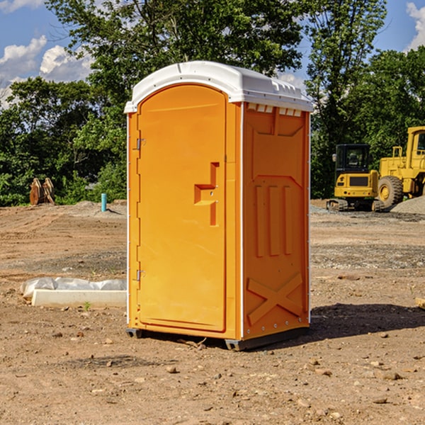 how often are the portable restrooms cleaned and serviced during a rental period in Lambrook